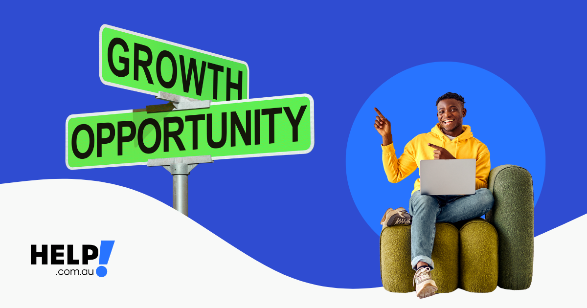 Student sitting in chair studying with a growth opportunity sign behind him