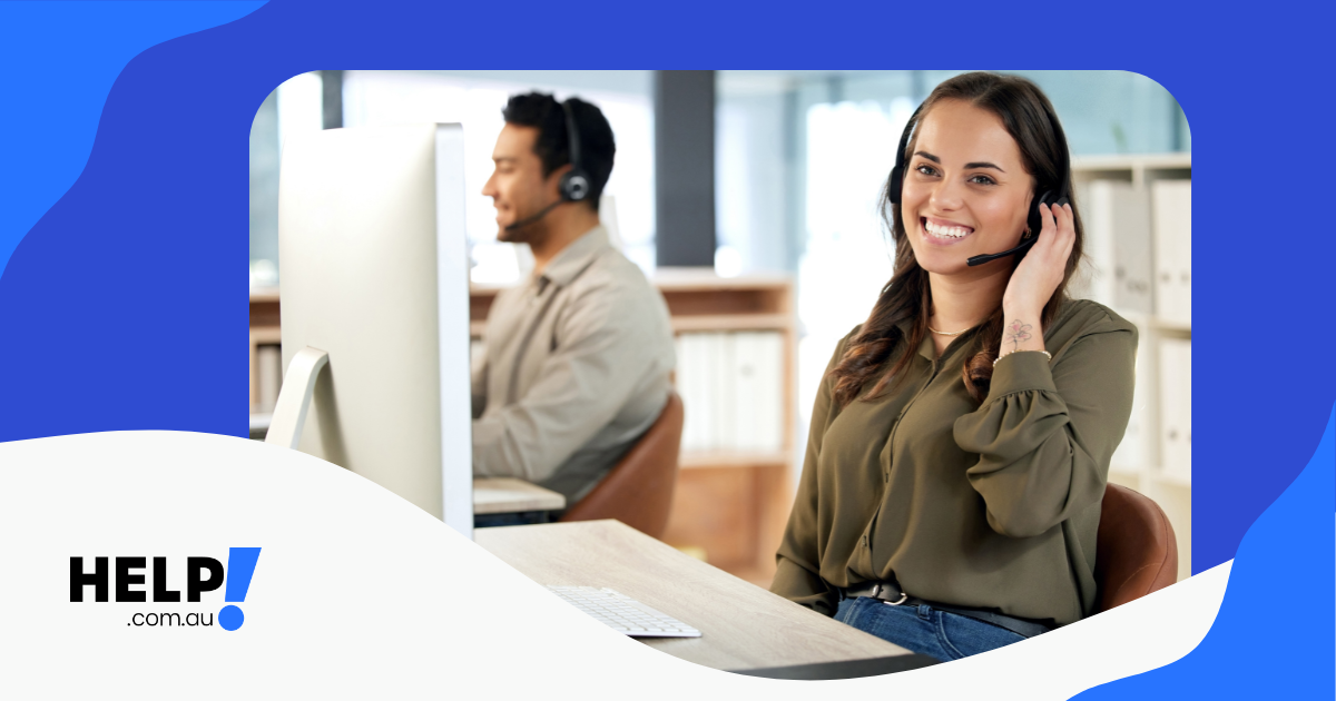 Woman smiling sitting in a call center