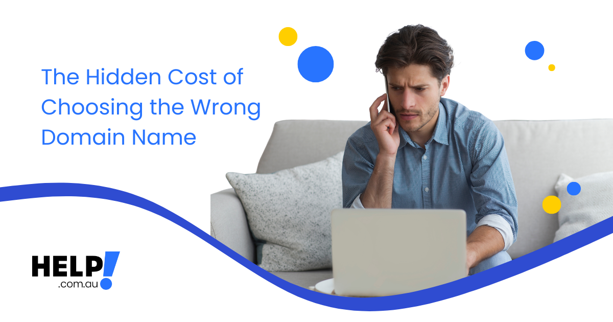 Man sitting on couch using laptop and on the phone, concerned he had bought the wrong domain name